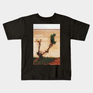 Grapevine Tree Growing Through Wall Kids T-Shirt